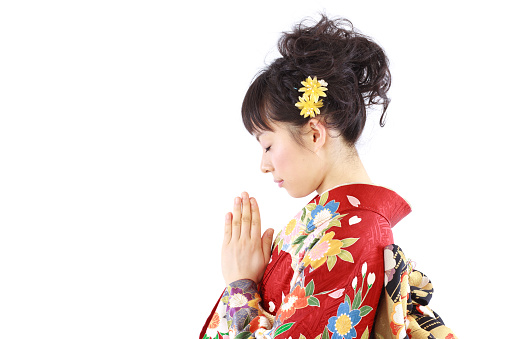 Japanese woman wearing kimono making gestures