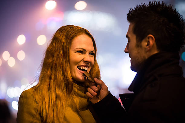 istock Sweet love - eating chocolate together 612819568