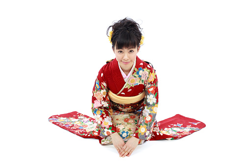 Japanese woman wearing kimono in white background