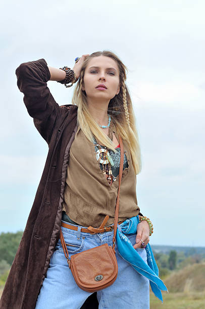 istock Fashion model dressed as a hippie 612822352
