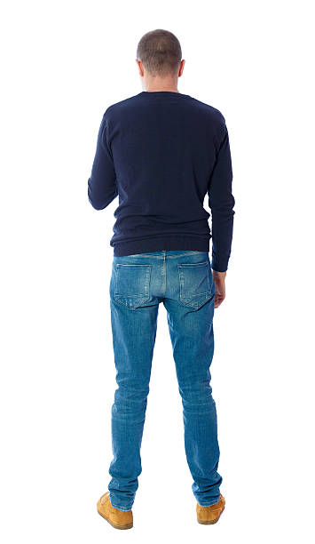 istock Back view of man in jeans. 612822806