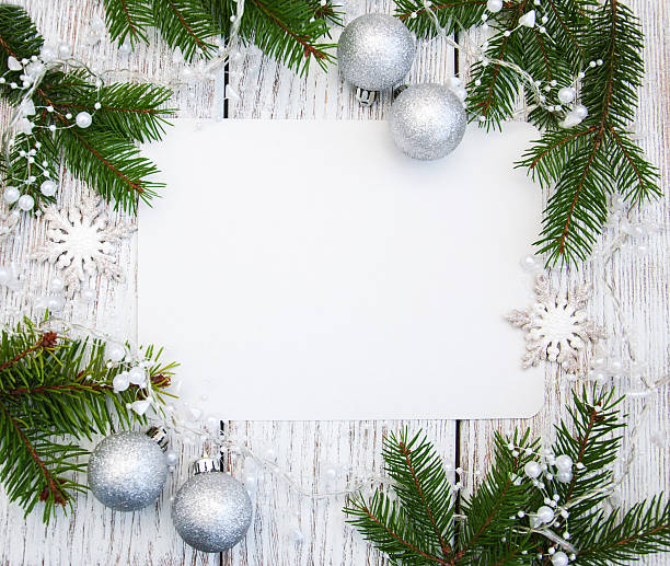 istock christmas background - blank paper with decoration 612823046
