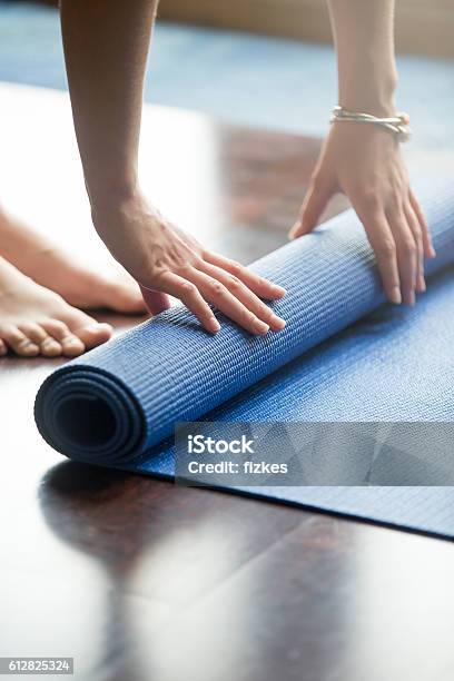 Yoga Practice Is Over Stock Photo - Download Image Now - Exercise Mat, Pilates, Gym