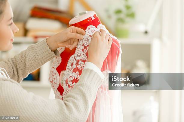 Woman Dressing A Tailor Dummy Mannequin Stock Photo - Download Image Now - Achievement, Adult, Art And Craft