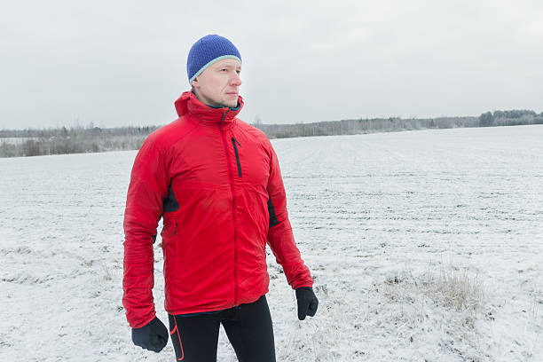 istock Man wearing protective sport jacket before his winter training session 612827292