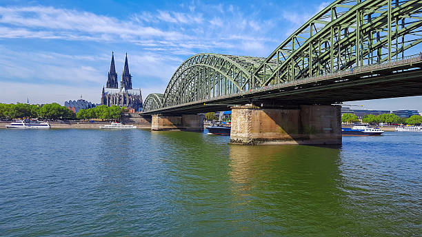 istock Cologne Cathedral and Hohenzollern bridge with freighter 612831756
