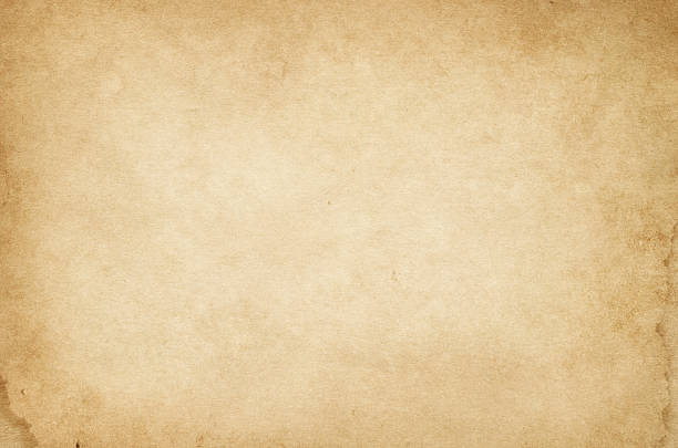istock Old dirty and yellowed paper texture. 612832662