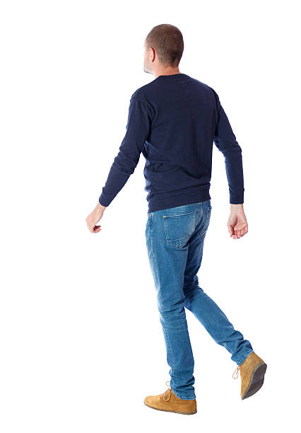 Back view of going  handsome man. Back view of going  handsome man. walking young guy . Rear view people collection.  backside view of person.  Isolated over white background. A guy in a black sweater passes. human back stock pictures, royalty-free photos & images