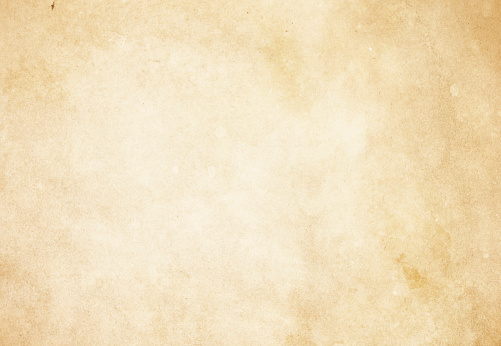 Aged dirty yellowed paper texture for the design.Abstract vintage paper background.