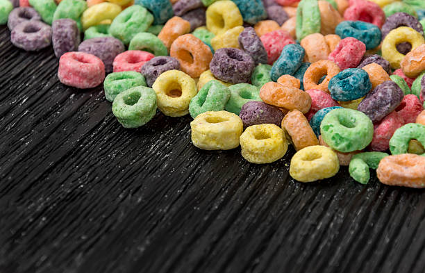 istock colorful cereal on wooden background 612835754