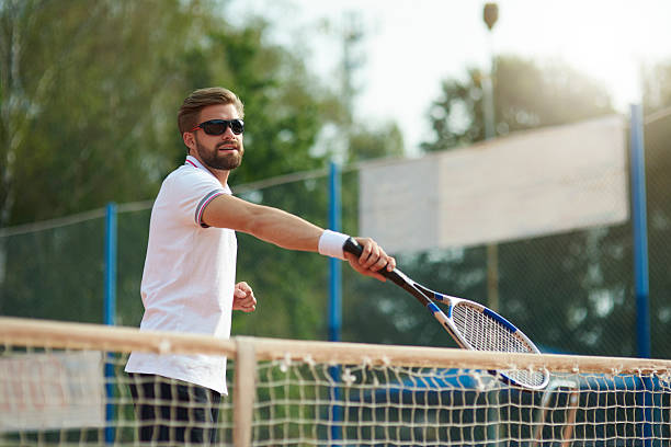 istock The tennis player is wearing sunglasses 612836522