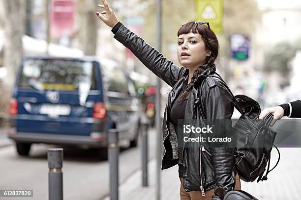 Distracted Brunette Female Tourist And A Pickpocket Stock Photo - Download Image Now