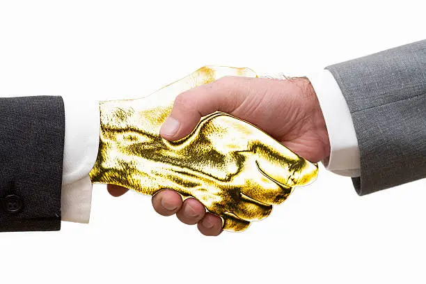 Photo of Gold handshake