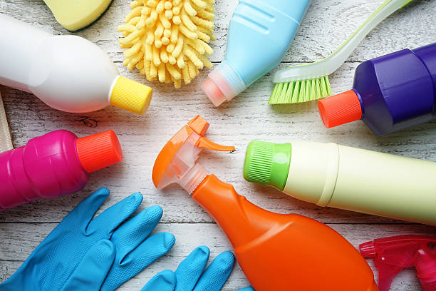 istock House cleaning product on wood table 612838656