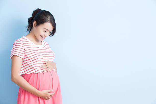 istock pregnant woman is smile 612838760