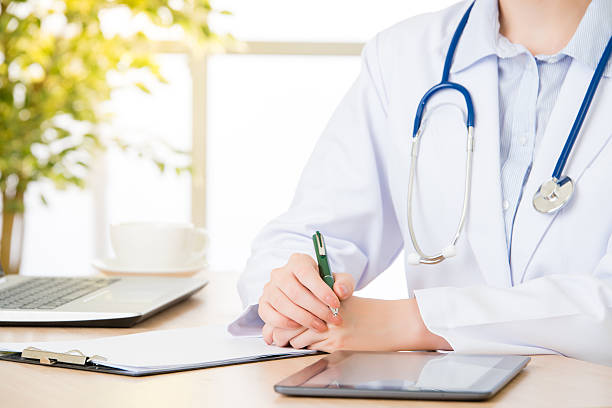 istock doctor using digital tablet to research patient's medical case 612839694