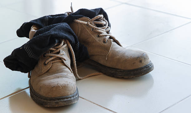 istock Old safety shoes with sock. 612839796