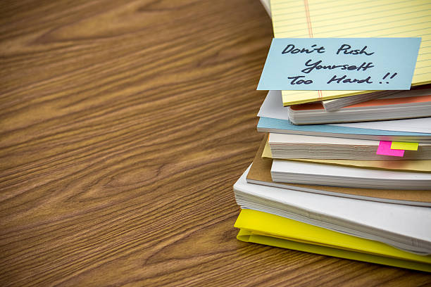 istock Don't Work Too Hard; The Pile of Business Documents 612840176