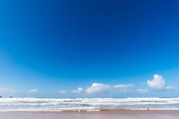 clear blue sky with lots of room fro copy space at Fistral beach, Newquay, Cornwall on a bright day in late september.