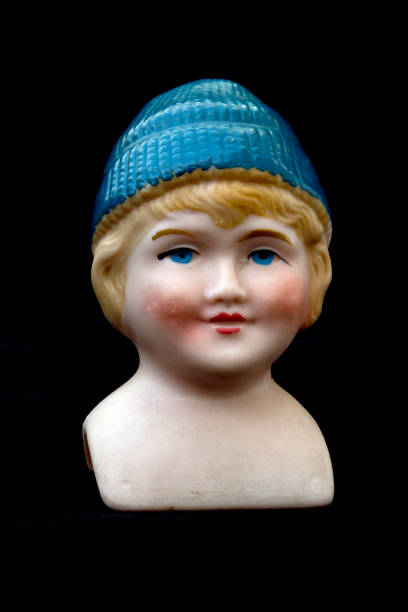 istock Close Up and Isolated Vintage Antique Old Doll 612842370