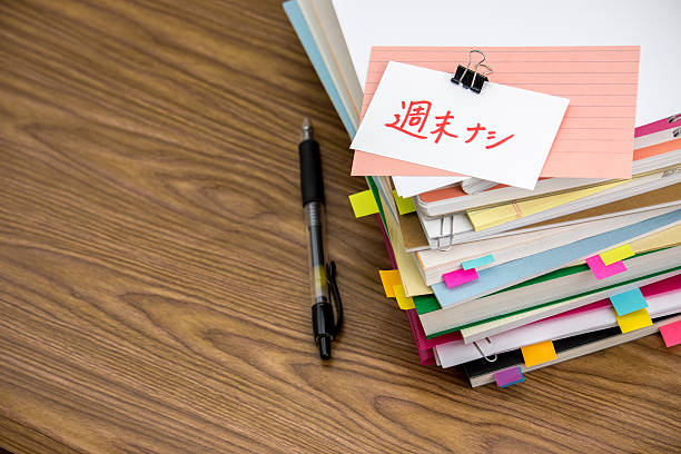 istock No Weekend; The Pile of Business Documents on the Desk 612842432