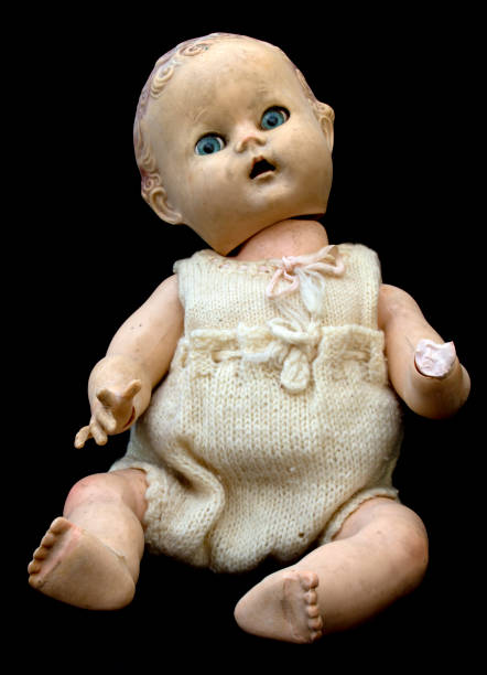 istock Close Up and Isolated Vintage Antique Old Doll 612842688