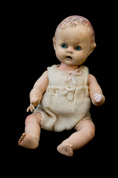 istock Close Up and Isolated Vintage Antique Old Doll 612842872