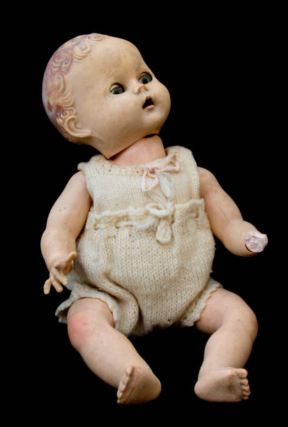 istock Close Up and Isolated Vintage Antique Old Doll 612843002