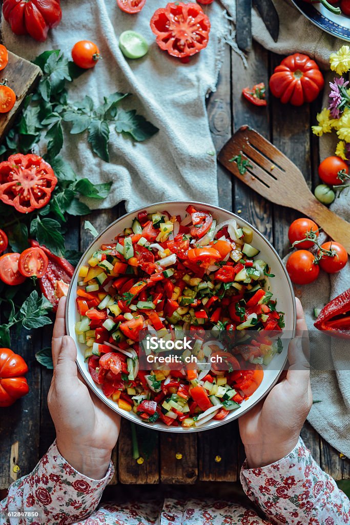 Mixed salad with radish. Caprese Salad. Cherry tomato mozzarella Mixed salad with radish. Caprese Salad. Cherry tomato mozzarella salad. Raw zucchini spaghetti with pesto and cherry tomatoes Appetizer Stock Photo