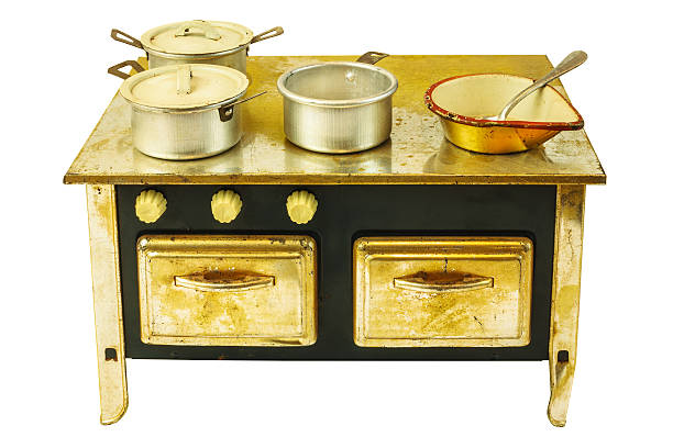 istock Retro doll house cooking stove isolated on white 612849168