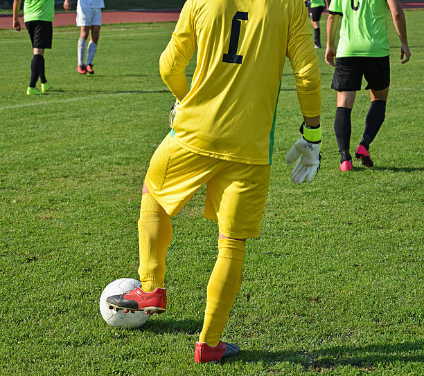istock Soccer goalkeeper with a ball 612850142