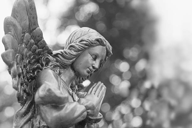 istock Figure of a praying angel 612850728