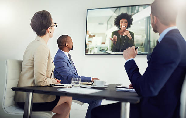 global meetings held in real time - video conference imagens e fotografias de stock