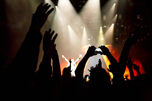 istock Take photo in front of concert stage 612855626