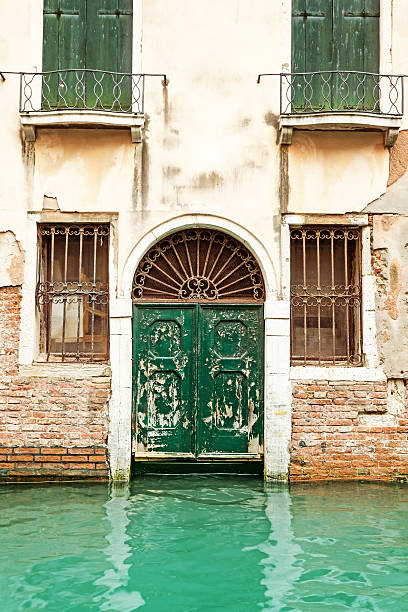 istock Old entrance door in Venice 612857362