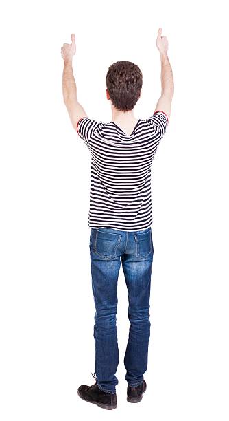 istock Back view of  man thumbs up. 612858308