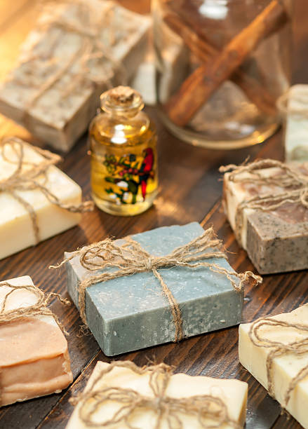 istock Organic handmade soap with cinnamon on wooden background 612859568