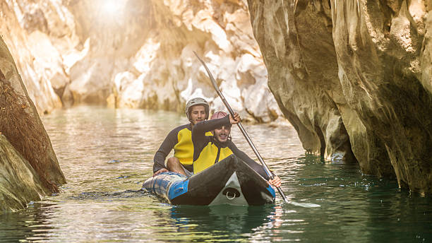 istock Two men in  life jackets on a rafting 612859696