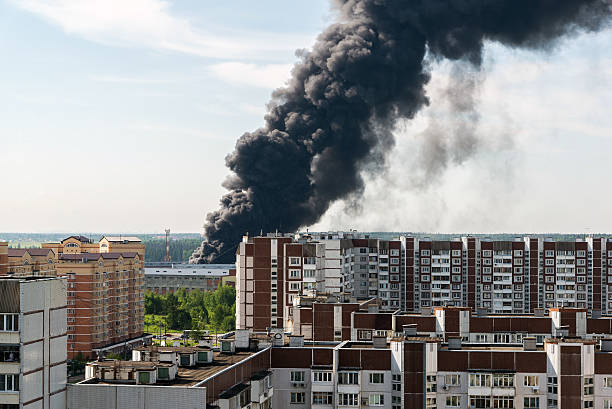 istock Black smoke from a major fire in Moscow, Russia 612859718