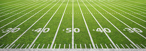 istock american football field and grass 612860166