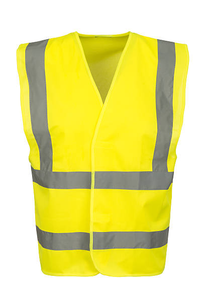 Cutout of Front of Yellow Safety Vest Cutout of a yellow safety vest viewed at the front. reflector stock pictures, royalty-free photos & images