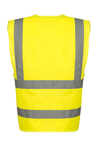 Cutout of Rear of Yellow Safety Vest Rear of a yellow reflective safety vest. reflector stock pictures, royalty-free photos & images