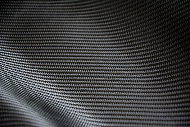 istock Carbon fiber composite raw material background 612861712