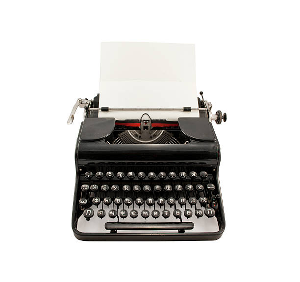 istock Old typerwiter with cyrillic letters on white background 612862308