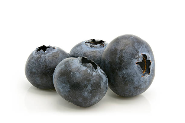istock Group of fresh blueberries on white 612862756