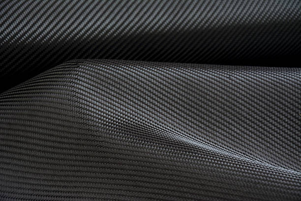 istock Carbon fiber composite raw material background 612863194