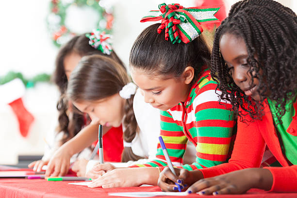 istock Diverse friends creat Christmas cards 612863278