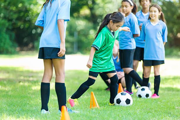 istock Little girl during soccer practice 613011668