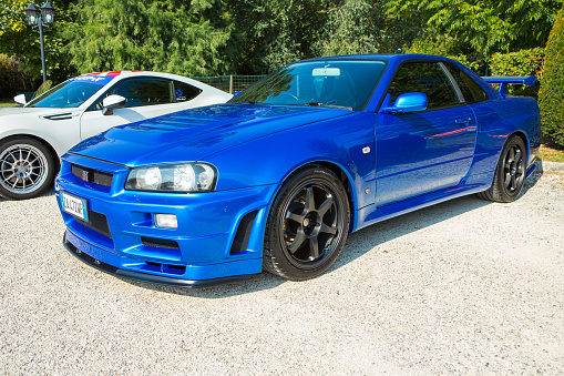 Mogliano Veneto, Italy - September 11, 2016: Photo of a Nissan Skyline GT-R R34. The Nissan GT-R is a 2-door 2+2 sports car produced by Nissan, VA·spec models were released in January 1999.
