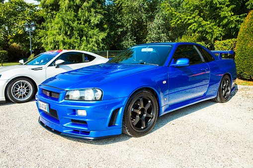Mogliano Veneto, Italy - September 11, 2016: Photo of a Nissan Skyline GT-R R34. The Nissan GT-R is a 2-door 2+2 sports car produced by Nissan, VA·spec models were released in January 1999.